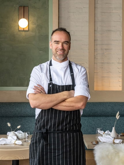 Chef standing in his restaurant