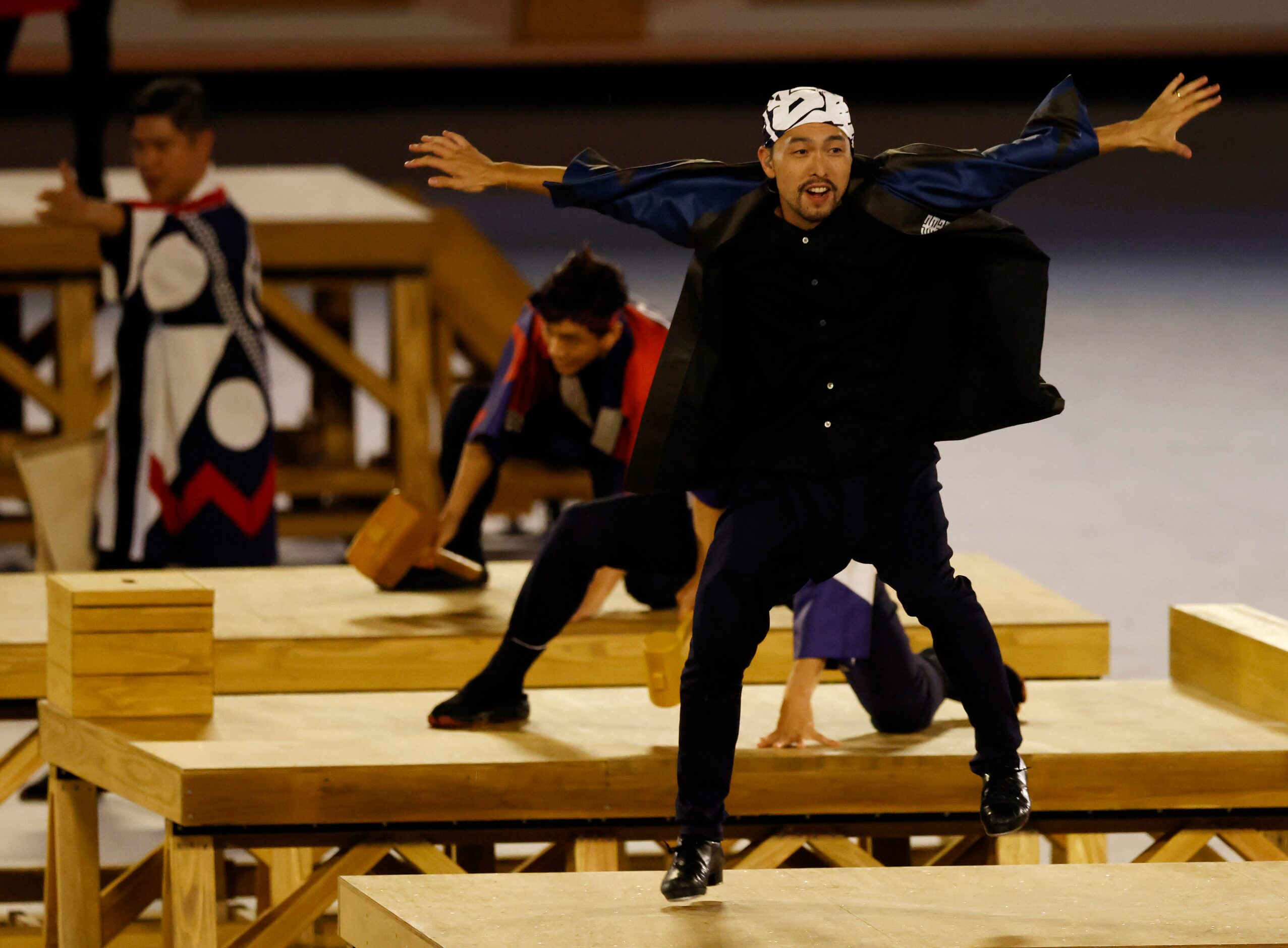 Dancers performs during the opening ceremony for the postponed 2020 Tokyo Olympics at...