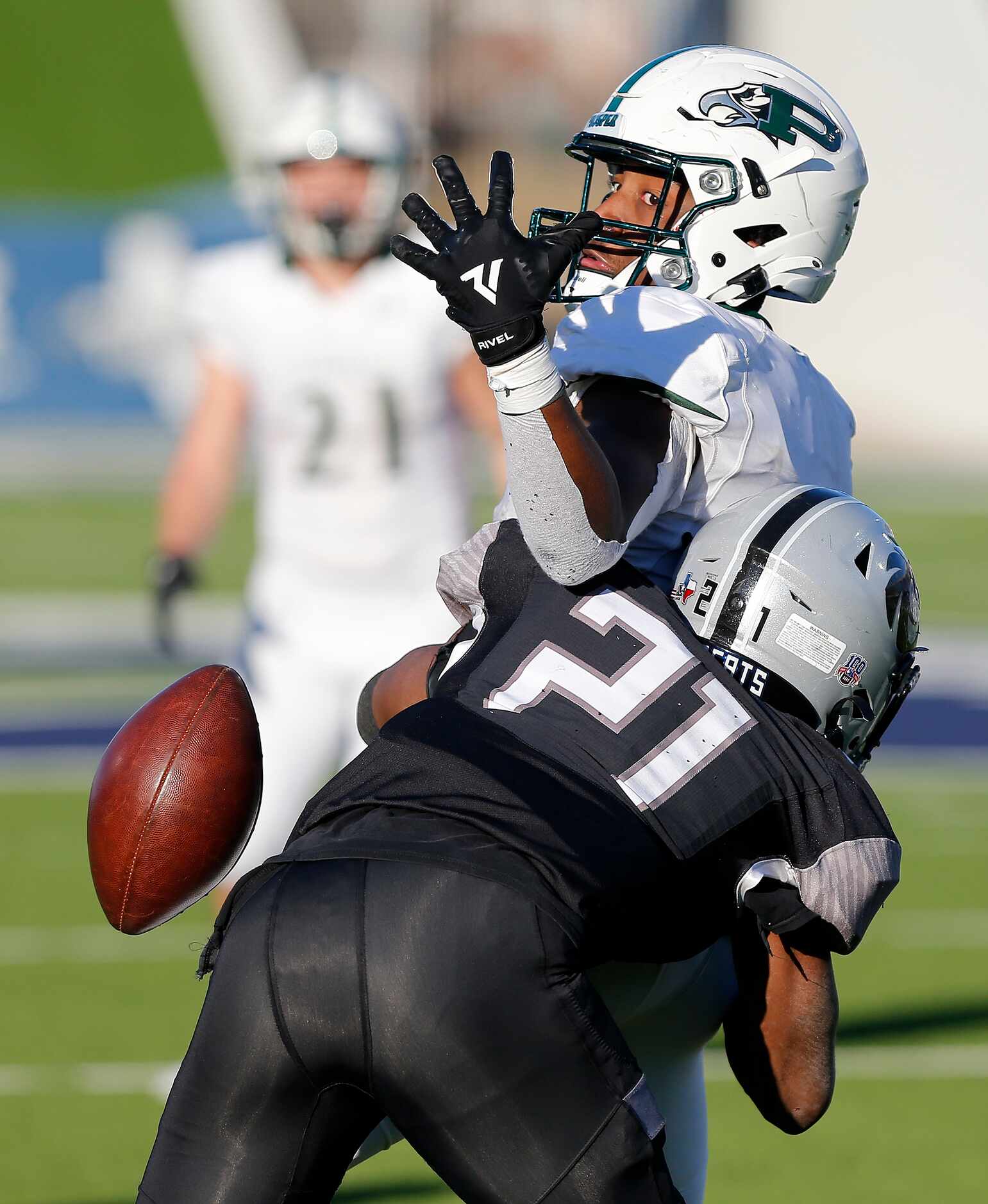 Denton Guyer High School defensive back Ryan Yaites (21) breaks up a pass intended for...