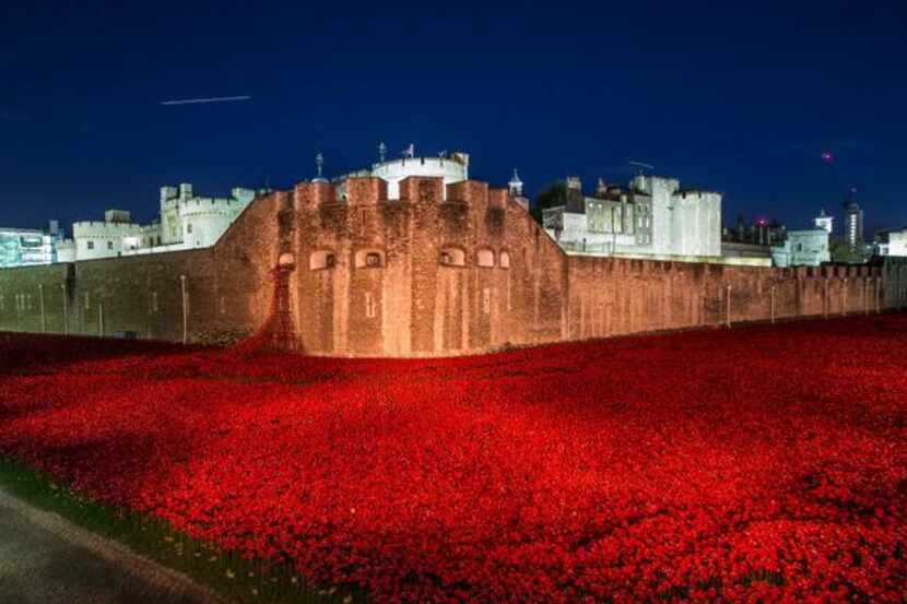 
Visitors viewed the 'Blood Swept Lands and Seas of Red' installation at the Tower of London...