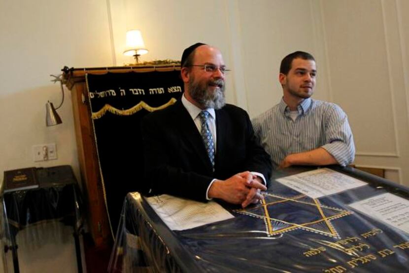 
Rabbi Yaakov Rich (left), with son Avrohom Moshe Rich, held a news conference Thursday at...