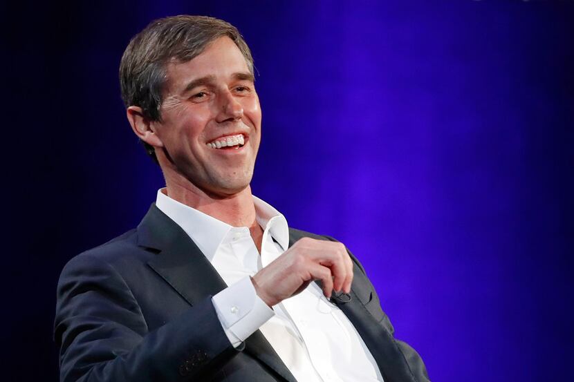 Former Texas Democratic congressman Beto O'Rourke laughs during a live interview with Oprah...