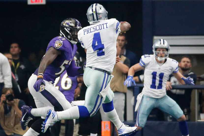 Dallas Cowboys quarterback Dak Prescott (4) throws a touchdown pass to receiver Cole Beasley...