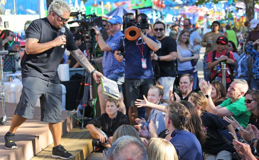 Guy Fieri is one of many celebrities who have visited the State Fair of Texas.