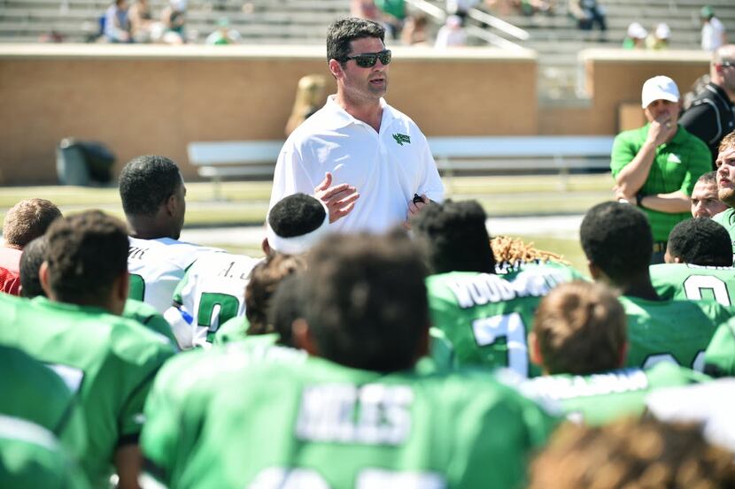 North Texas head coach Seth Littrell talks to players after the 2016 Green-White Spring...