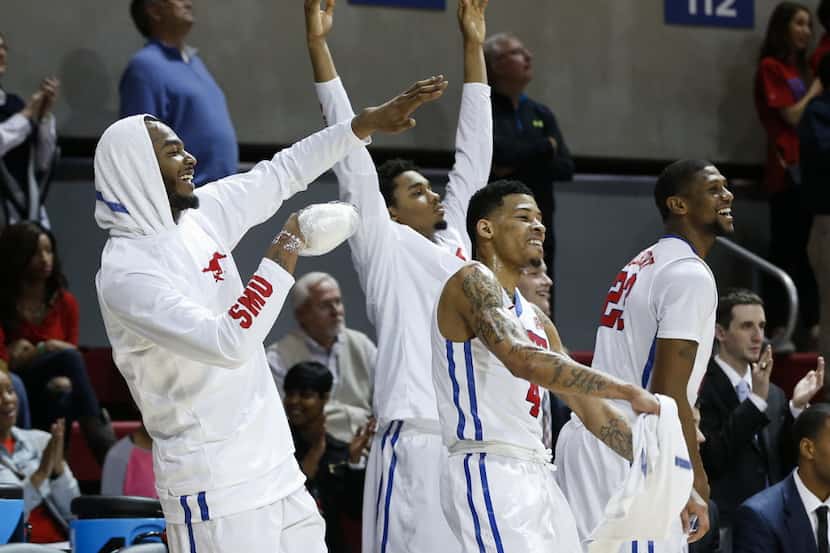 SMU teammates, left to right, Markus Kennedy, Ben Moore, Keith Frazier and Jordan Tolbert...