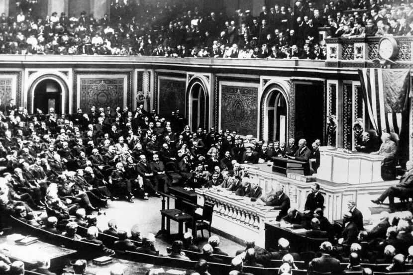 In this April 2, 1917 photo, President Woodrow Wilson delivers a speech to the joint session...