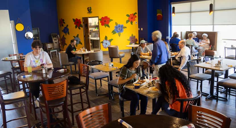 People eat at El Rincón del Maíz in Denton on Friday, Aug. 11, 2023. 