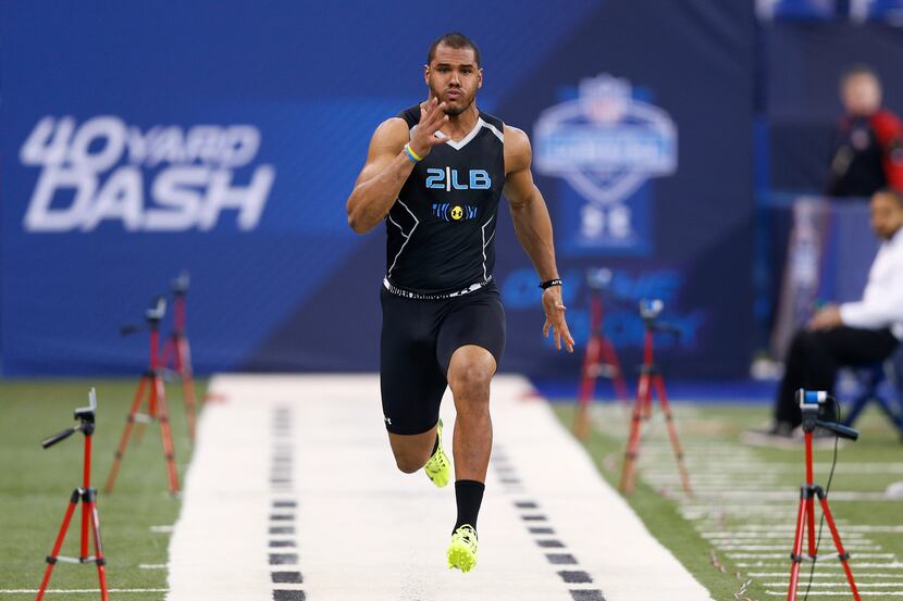Former UCLA linebacker Anthony Barr runs the 40-yard dash during the 2014 NFL Combine 