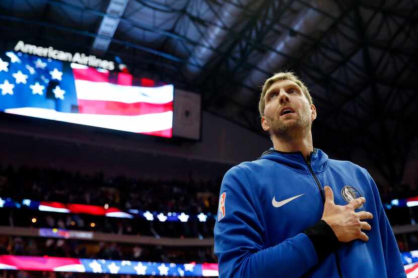 Dallas Mavericks forward Dirk Nowitzki (41) during the National Anthem before playing in his...