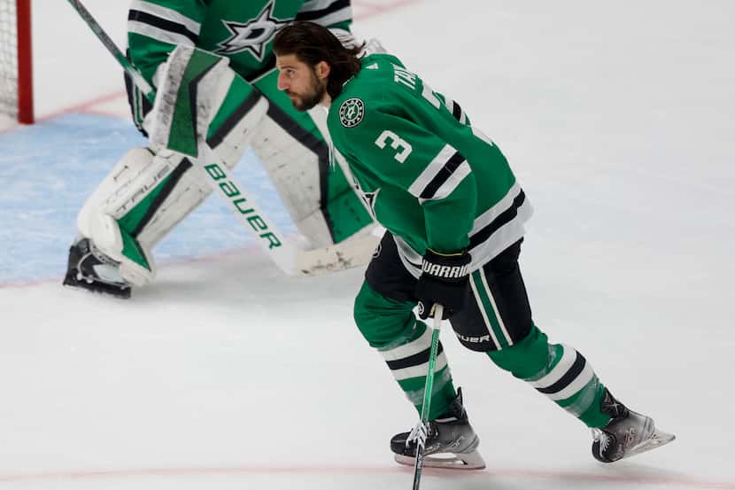 Dallas Stars defenseman Chris Tanev (3) warms up before Game 5 of the NHL hockey Stanley Cup...
