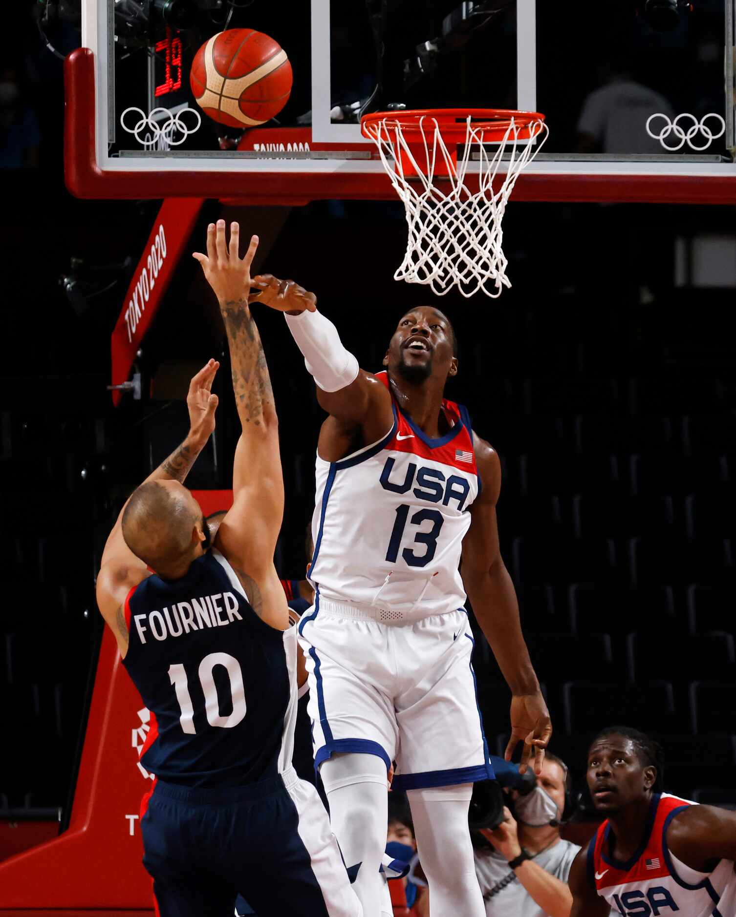 USA’s Bam Adebayo (13) blocks a shot from France’s Evan Fournier (10) during the first half...