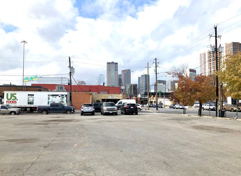 The building site is now a parking lot on Commerce Street east of downtown.