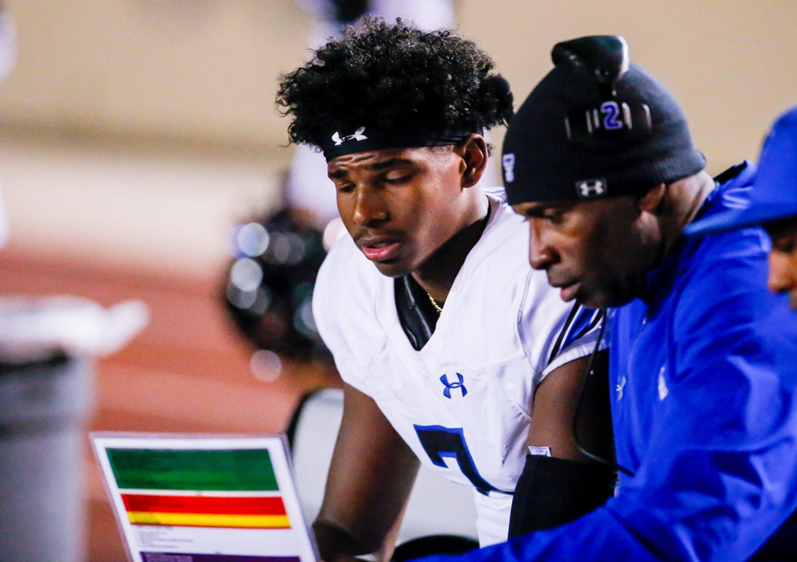 TXHSFB Trinity Christian Cedar Hill Shedeur Sanders, left, is coached by his dad and...