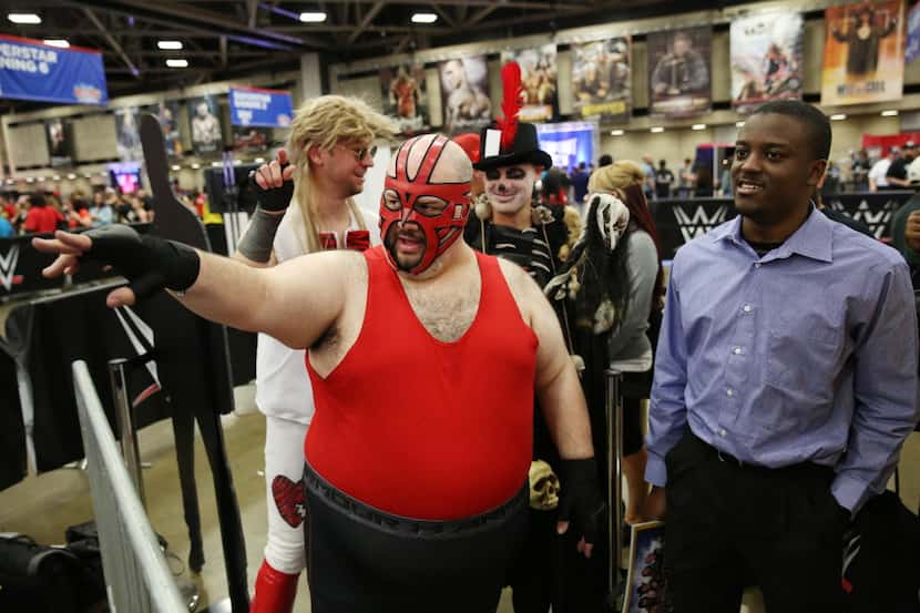 David Ranallo (left), of Pittsburgh, Pennsylvania, a fan who dressed as wrestler Big Van...