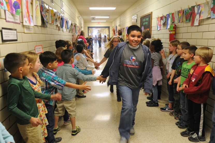  Students at Dyess Elementary School cheered on classmates set to take the STAAR test at a...