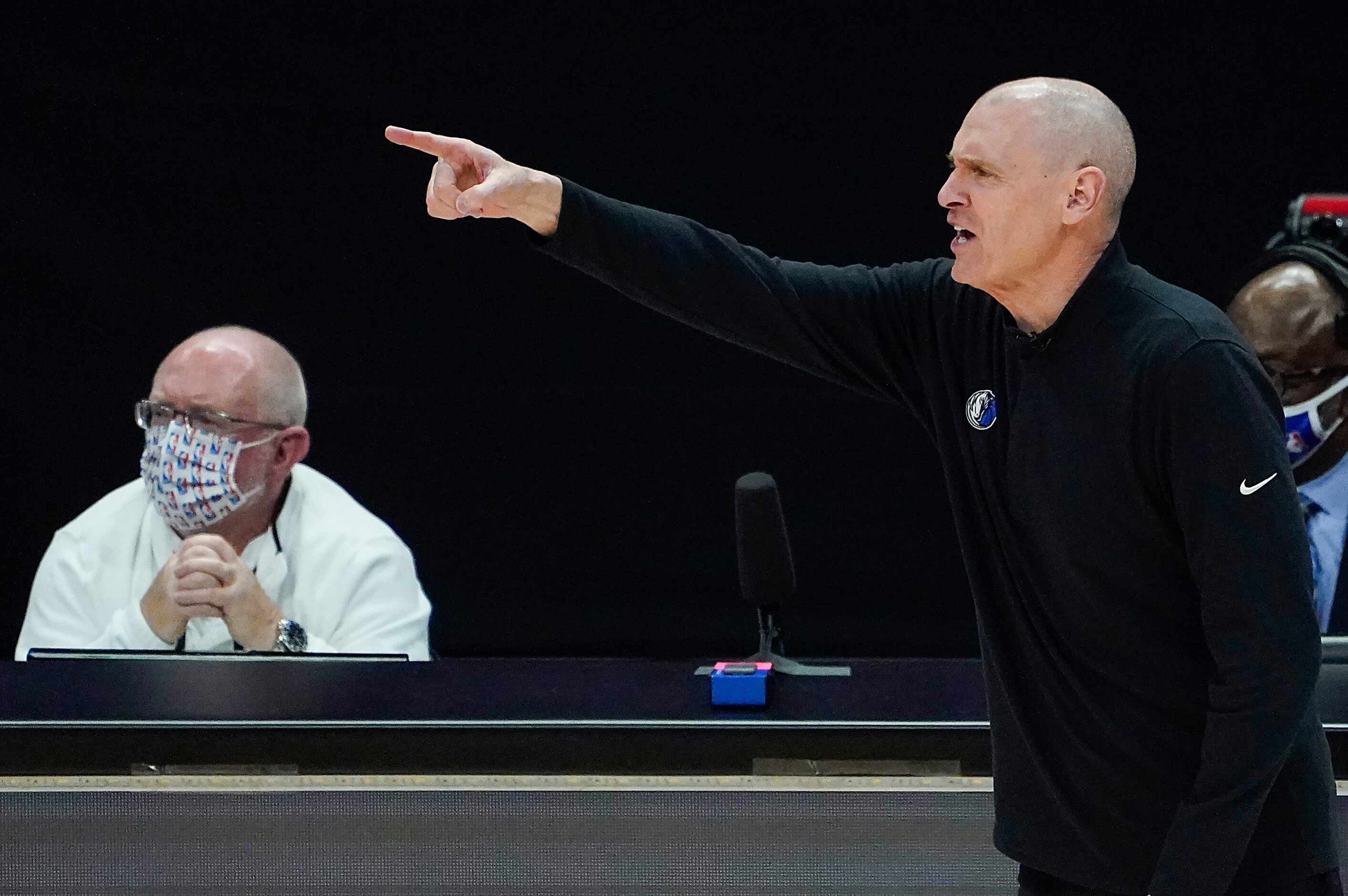 Dallas Mavericks head coach Rick Carlisle directs his team during the third quarter of an...