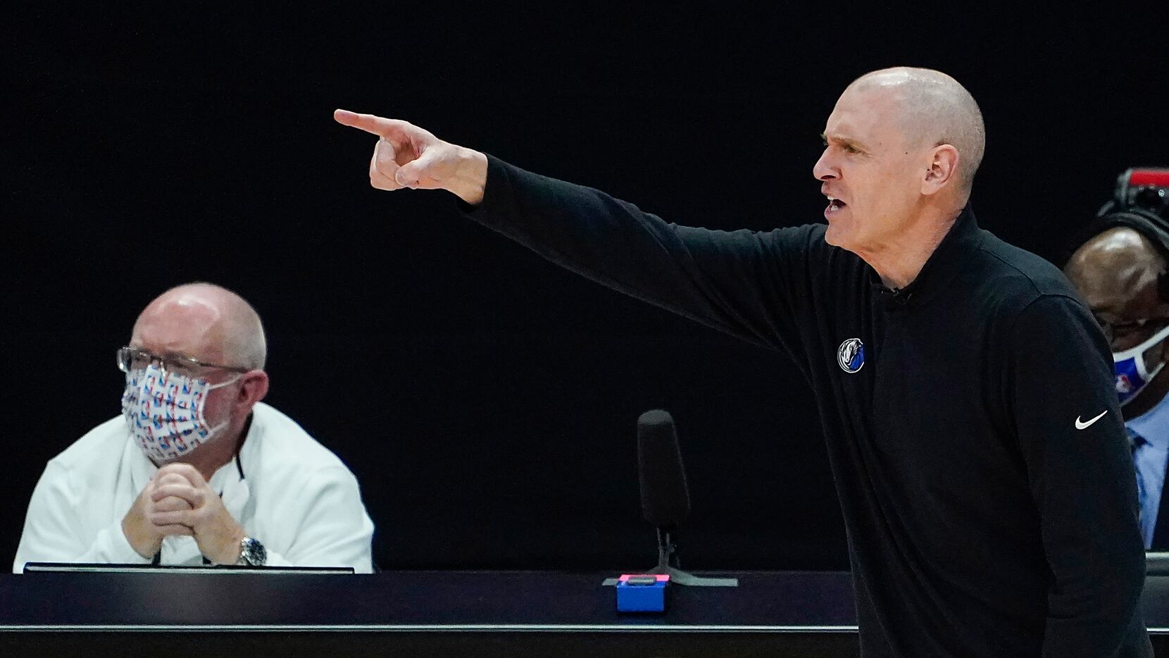 Dallas Mavericks head coach Rick Carlisle directs his team during the third quarter of an...