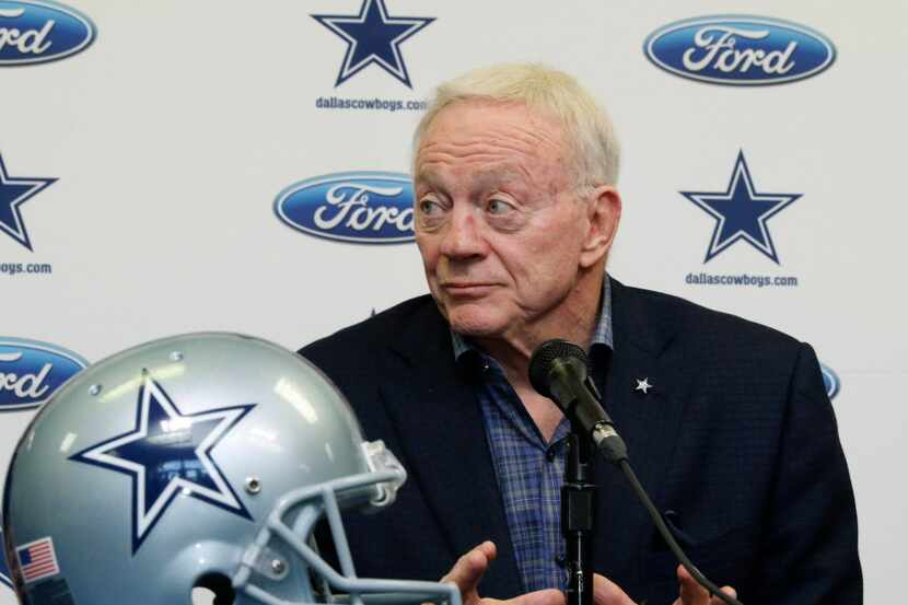 Dallas Cowboys owner and general manager Jerry Jones answers questions from the media during...