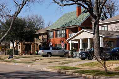 A mix of single-family houses and duplexes are seen along Kings Highway in Oak Cliff,...
