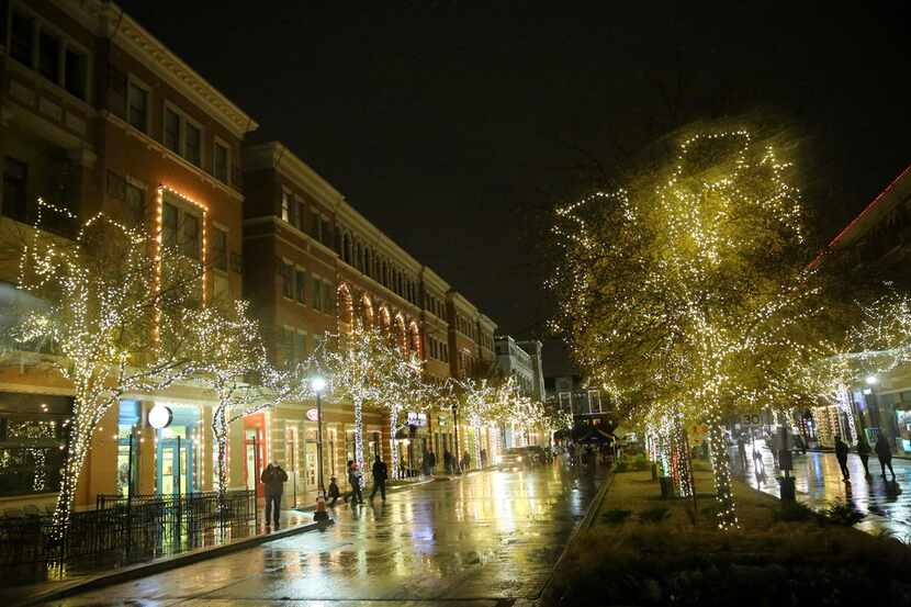 Lights illuminate the area during Christmas in the Square in downtown Frisco on Dec. 16,...