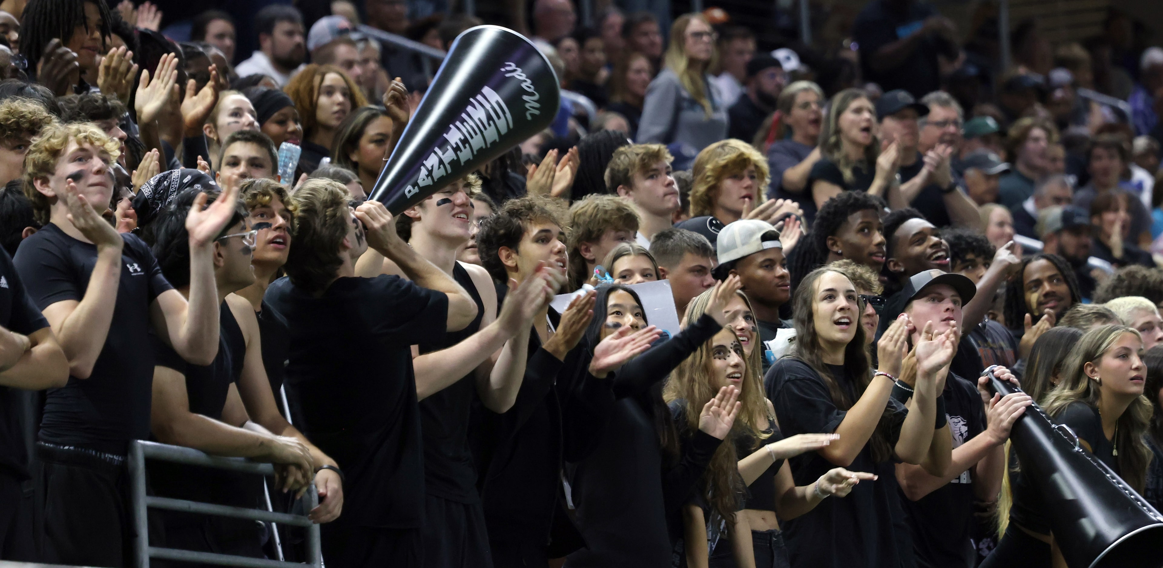 Frisco Panther Creek fans filling the student section voiced their support during first half...