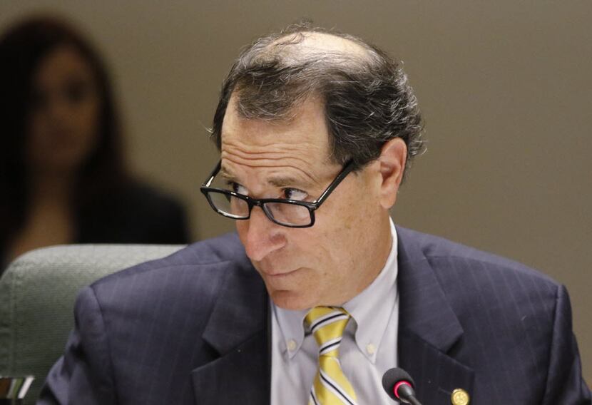 Dallas City Councilmember Lee M. Kleinman takes part in the council meeting on Tuesday,...