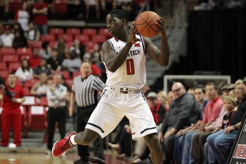 Mar 5, 2016; Lubbock, TX, USA; Texas Tech Red Raiders guard Devaugntah Williams (0) grabs a...