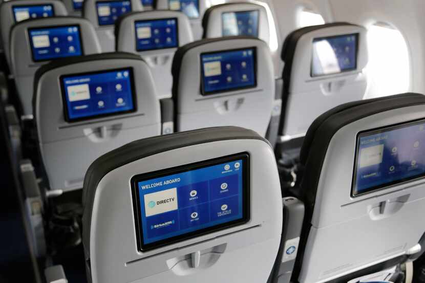 This Thursday, March 16, 2017, photo shows the interior of a JetBlue airliner at John F....