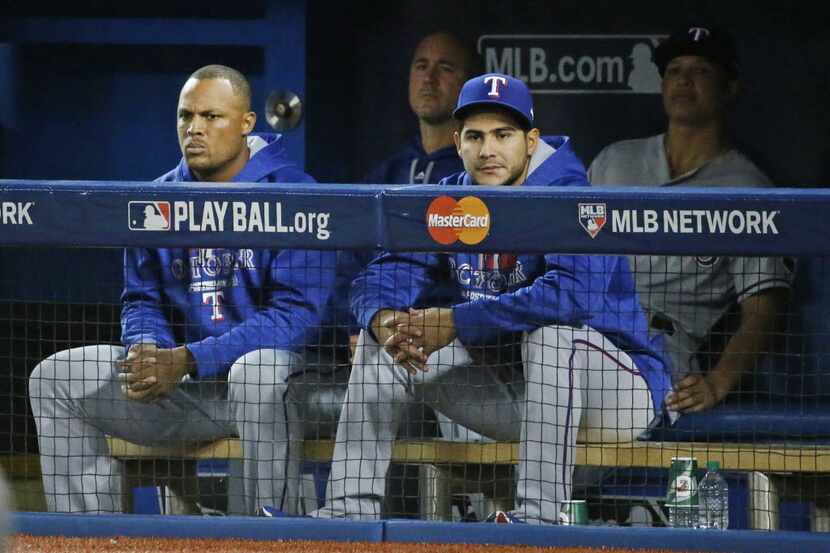 Adrian Beltre (left) will once again be a spectator during the AL Division Series. Manager...