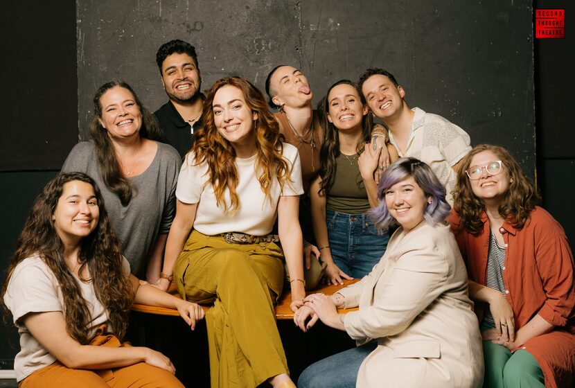 Former Dallas playwright Janielle Kastner (center) is surrounded by the cast and production...