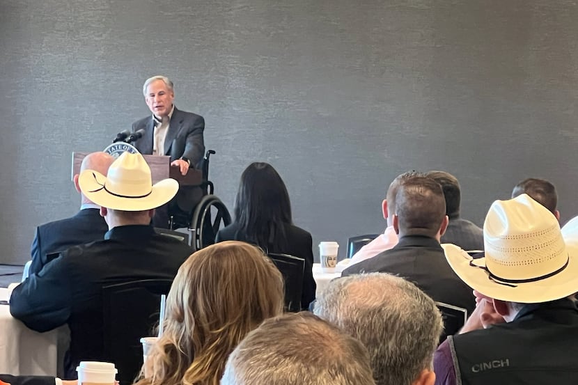 Texas Gov. Gregg Abbott addresses a coalition of Texas border sheriffs on Monday in El Paso.