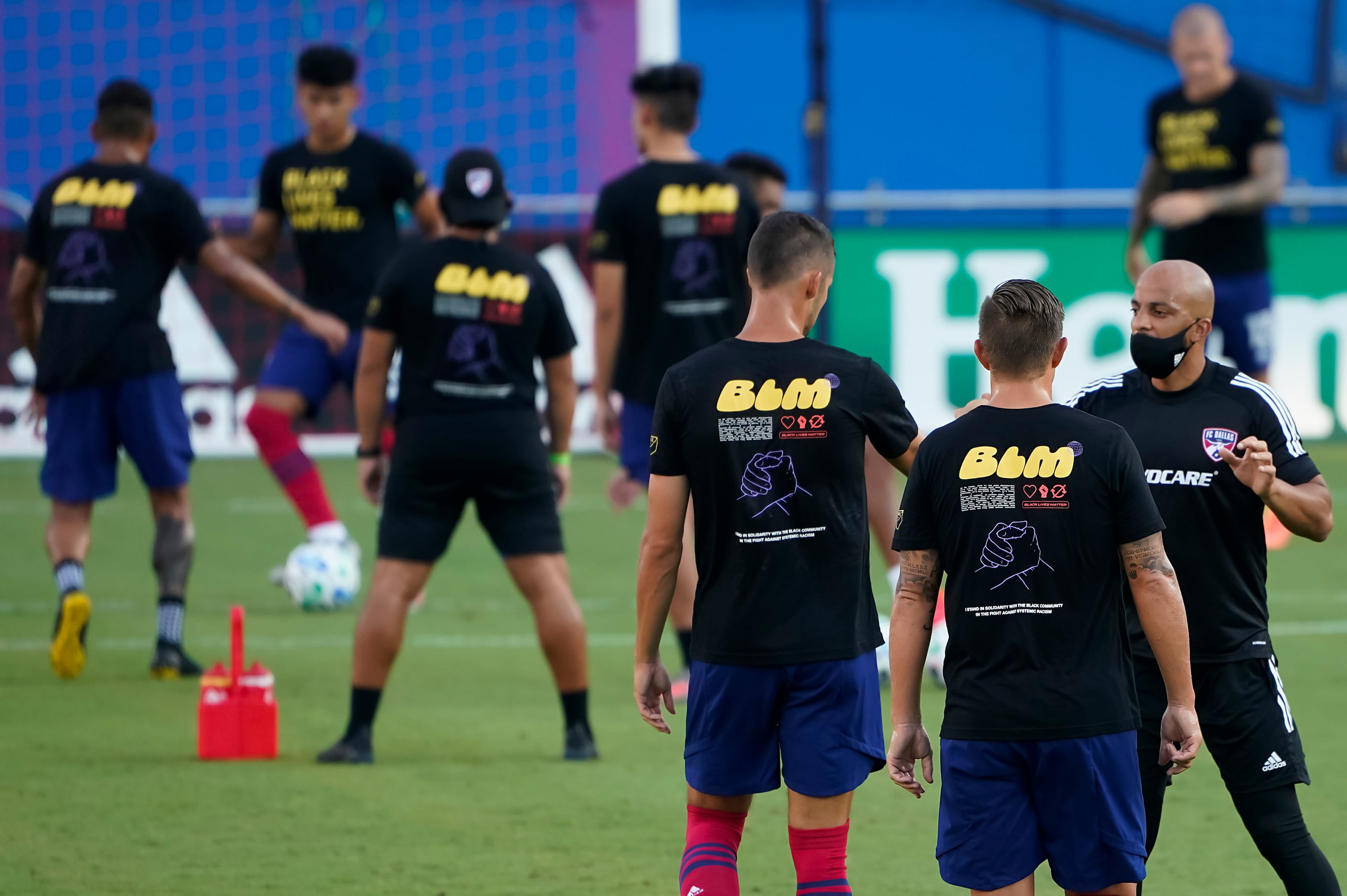 FC Dallas players wear shirts in support of Black Lives Matter before an MLS soccer game...