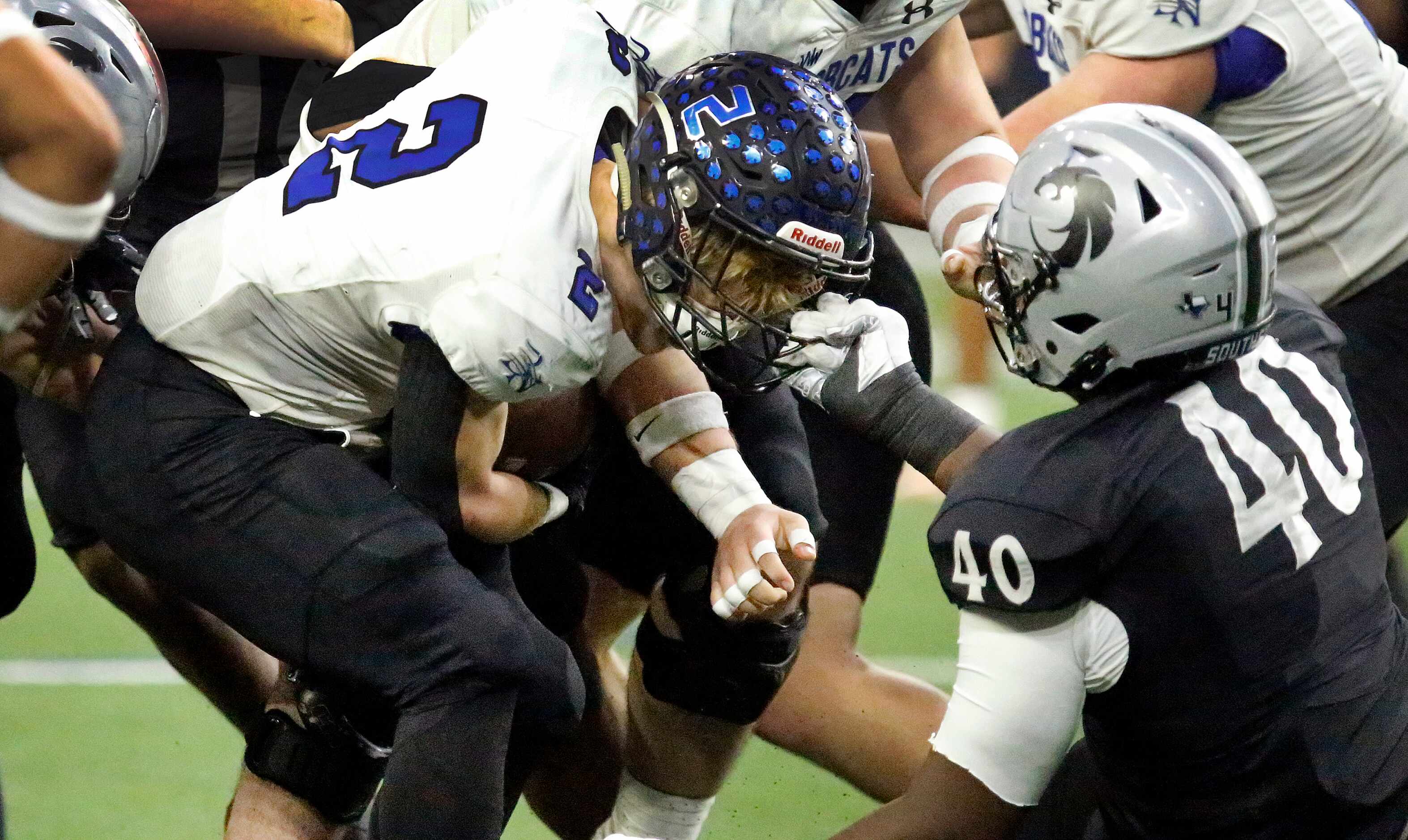 Guyer High School defensive tackle Xavier Ukponu (40) was flagged for a face mask penalty...