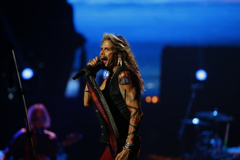 Steven Tyler sings on stage with Aerosmith at American Airlines Center in Dallas August 22, ...