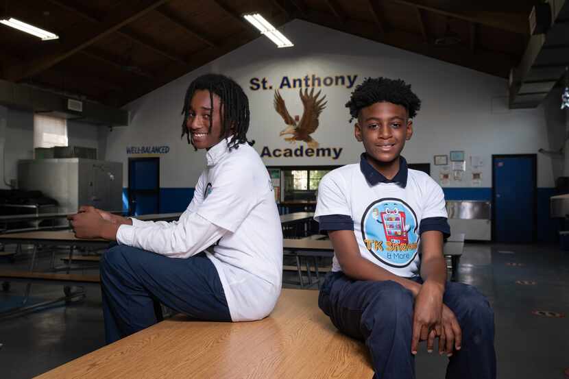 Co-owners Christian Williams, 12, left, Vincent McNuckles, 10, of TK Snacks and More, inside...