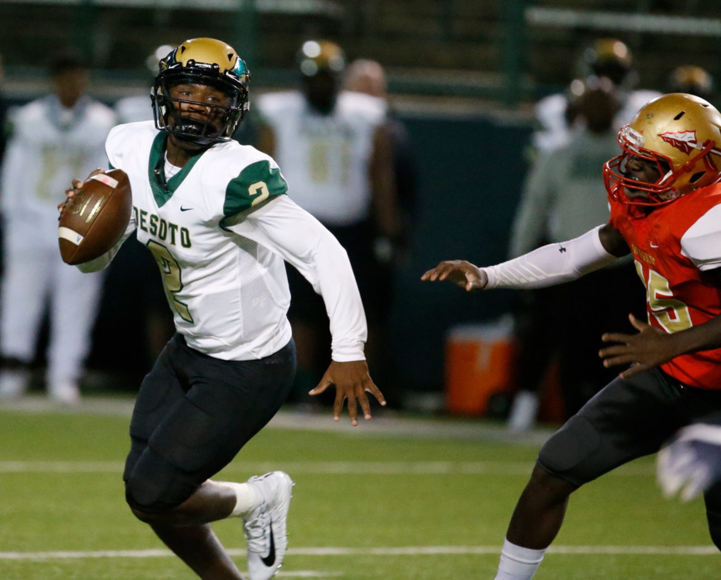 Desoto's Shun'Darion Ward (2) runs the ball against South Grand Prairie during the first...