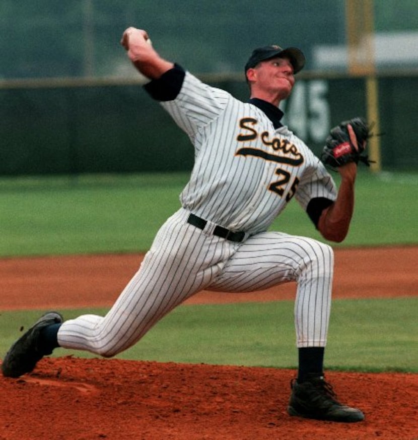 Highland Park pitcher #25 Chris Young throws a pitch in the first inning of action against...