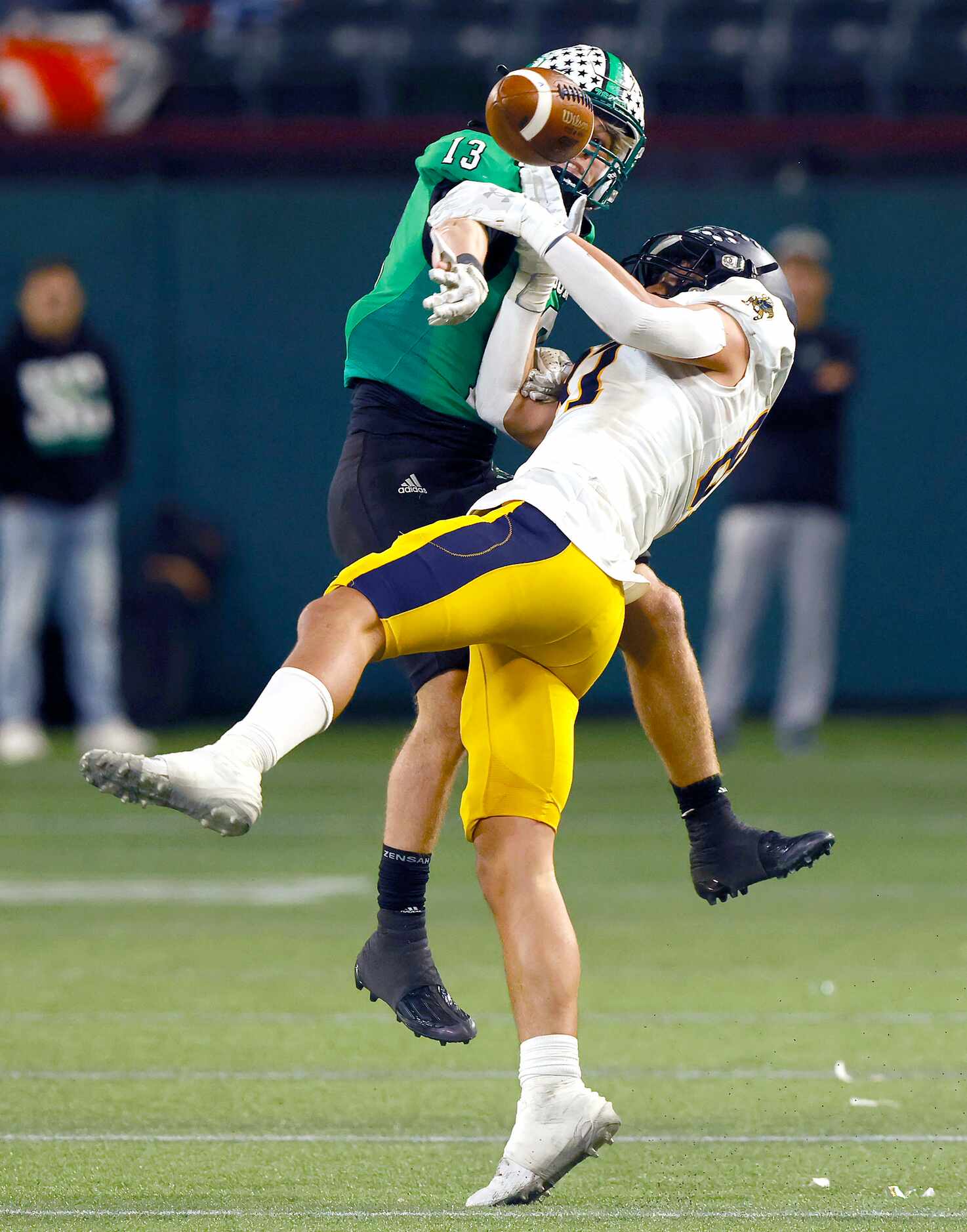 Southlake Carroll defensive back Trey Ferri (13) swats away a pass intended for Highland...