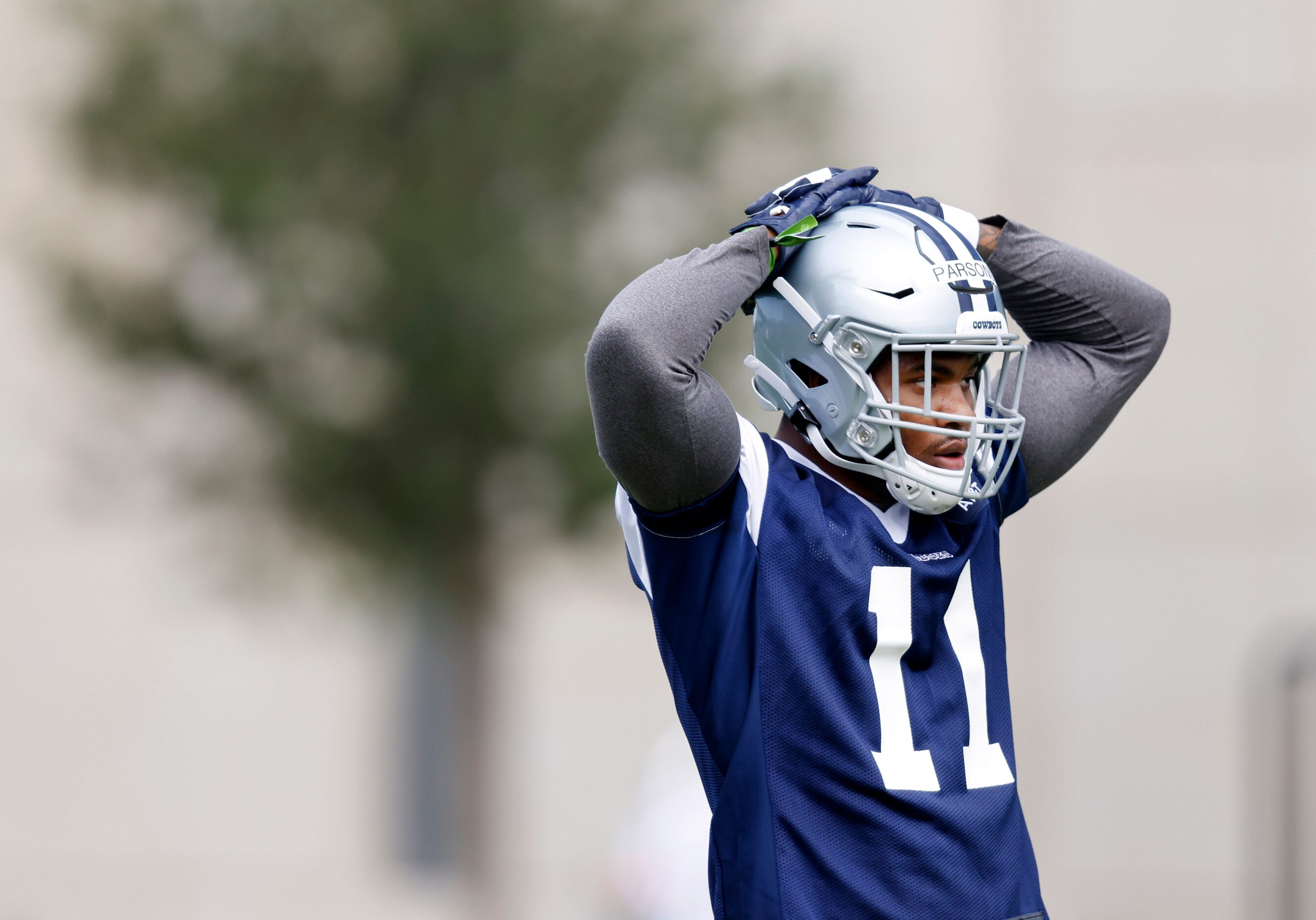 Dallas Cowboys rookie linebacker Micah Parsons (11) takes a breather during rookie minicamp...