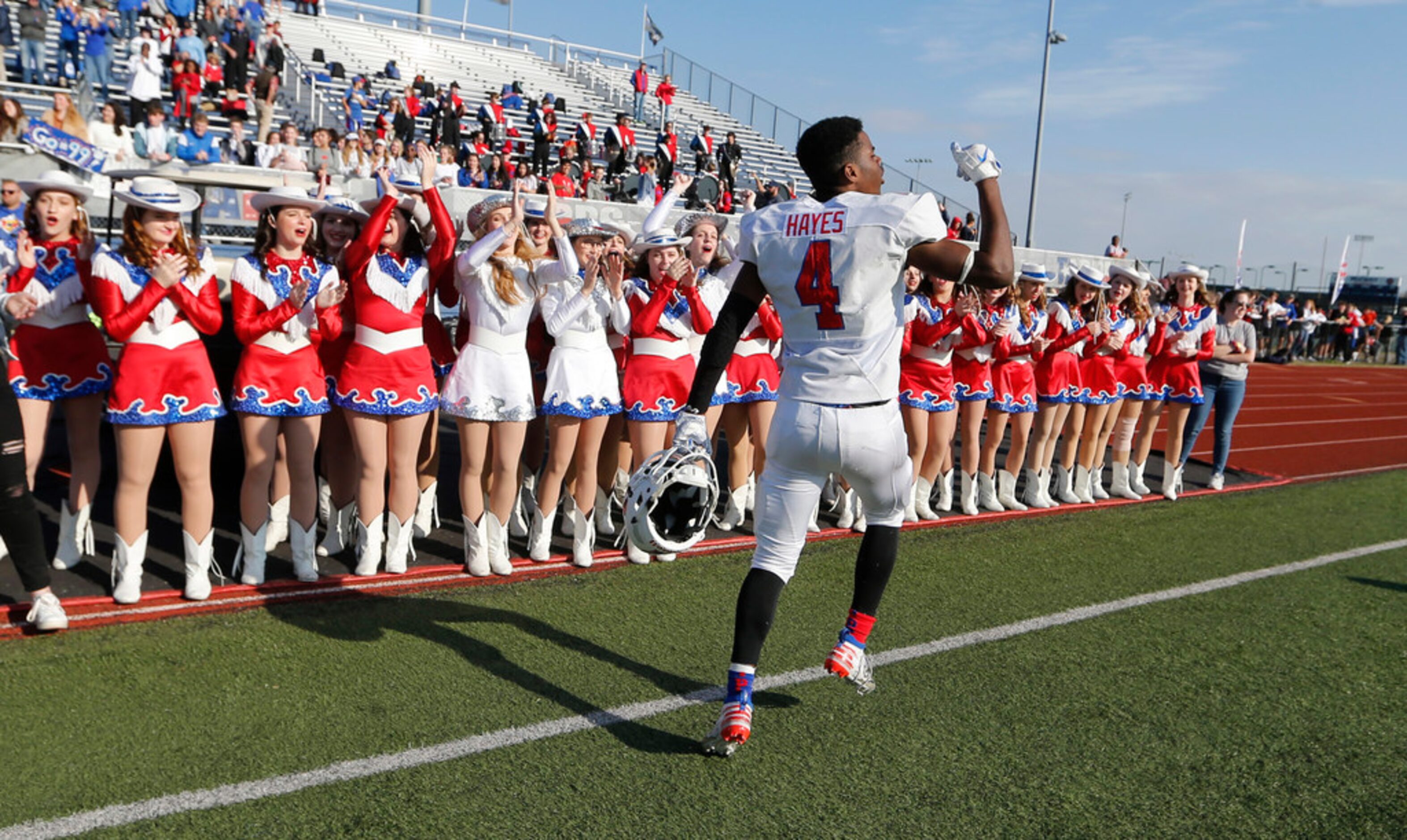 Parish Episcopal's Omari Hayes (4) celebrates on the sidelines after defeating Plano John...