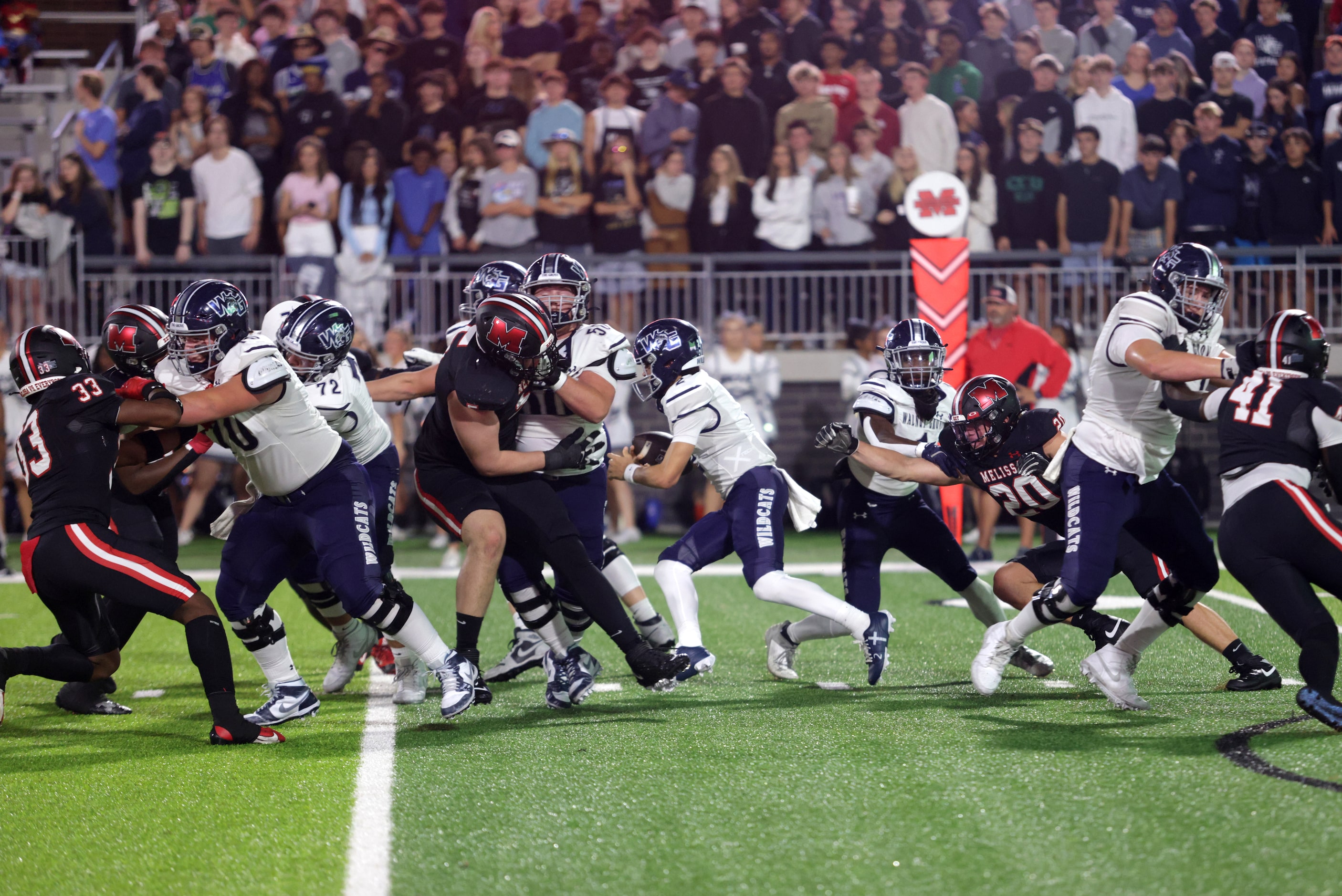 Walnut Grove player #2 Hayes Hackney looks for an open route during the Prosper Walnut Grove...