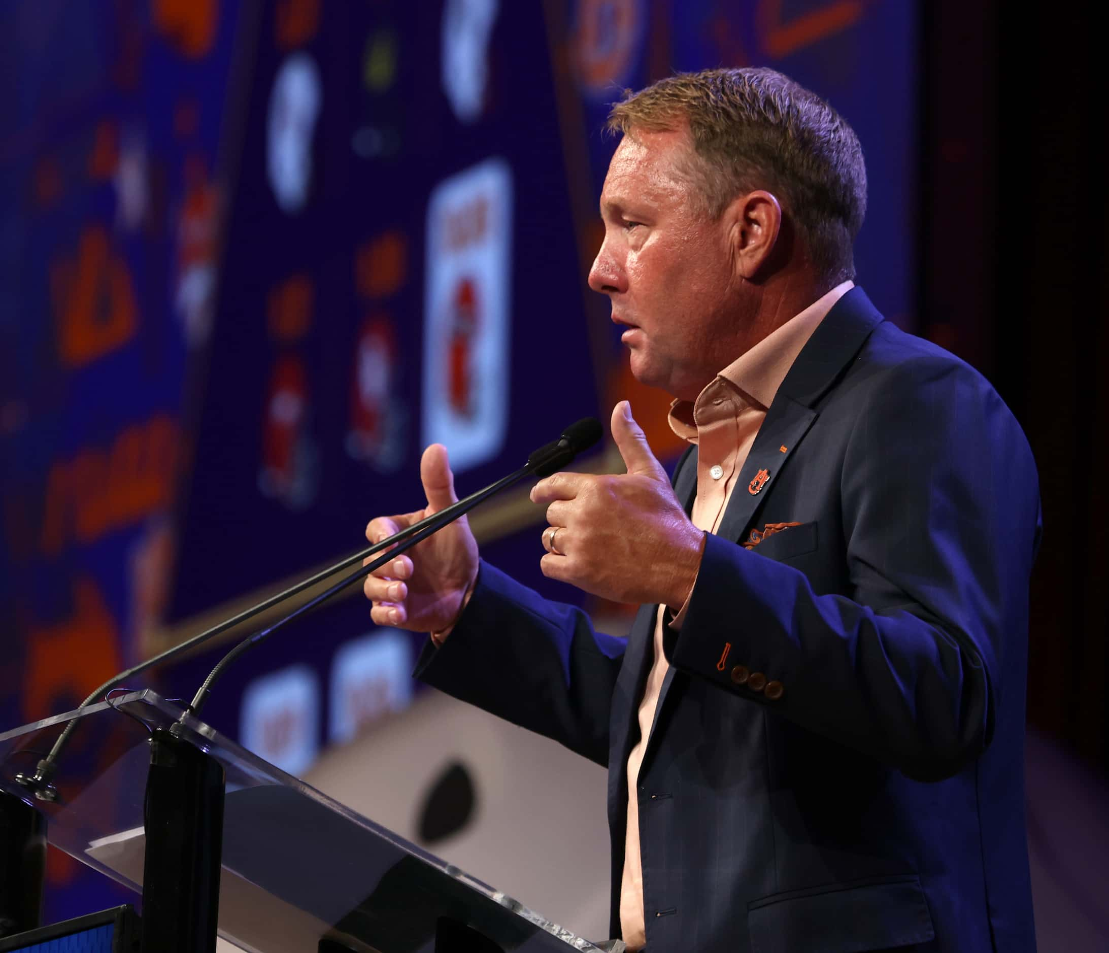 Auburn head football coach Hugh Freeze answers a question from a media member during the...