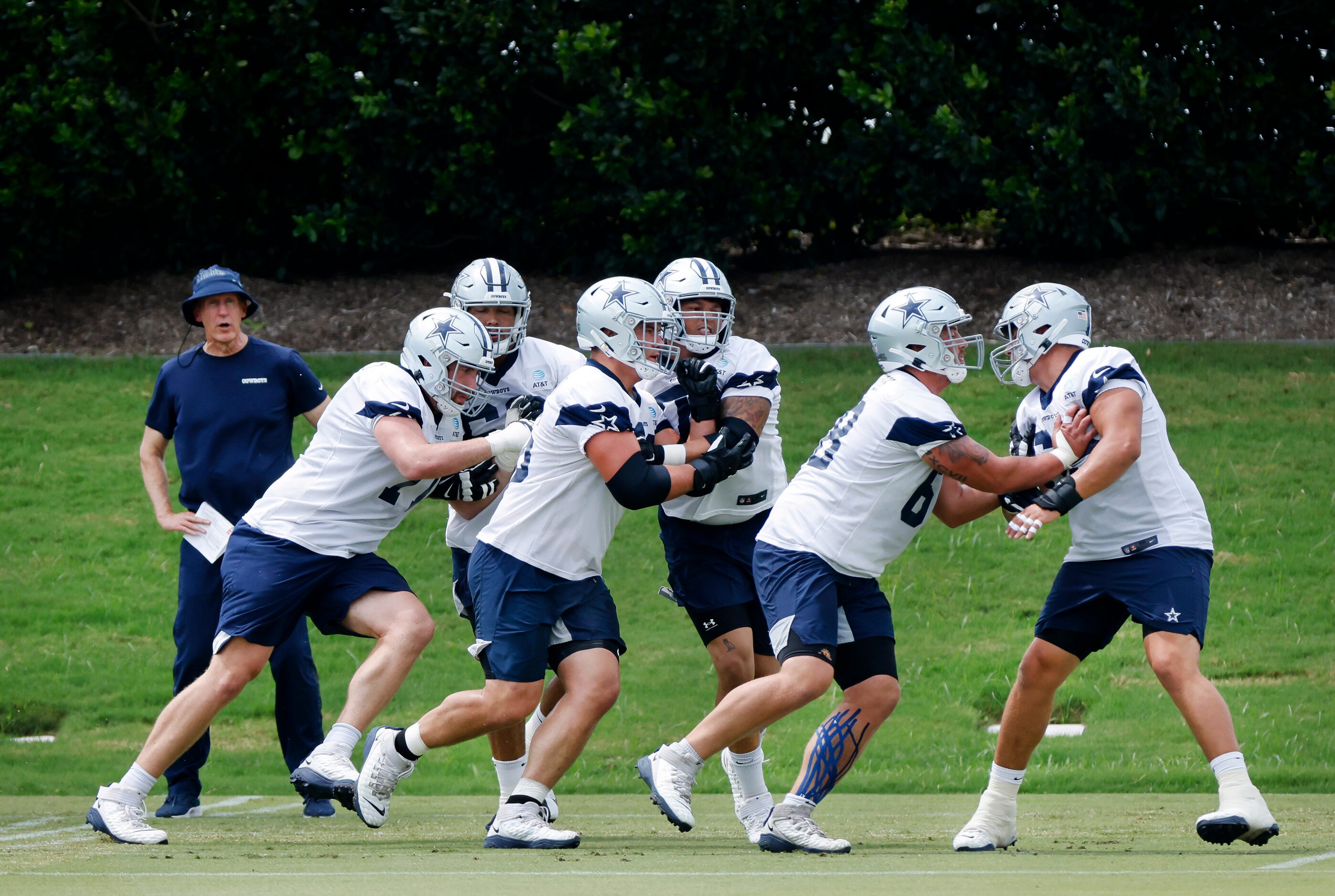 Dallas Cowboys offensive tackle Matt Waletzko (71), offensive tackle Isaac Alarcon (60),...