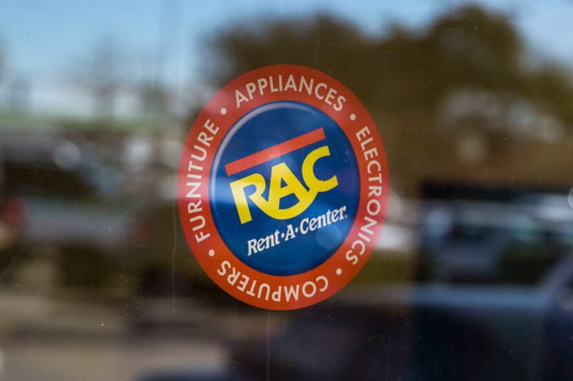 A sign on the front doorof a Rent-A-Center on the 5300 block of Ross Avenue in Dallas.