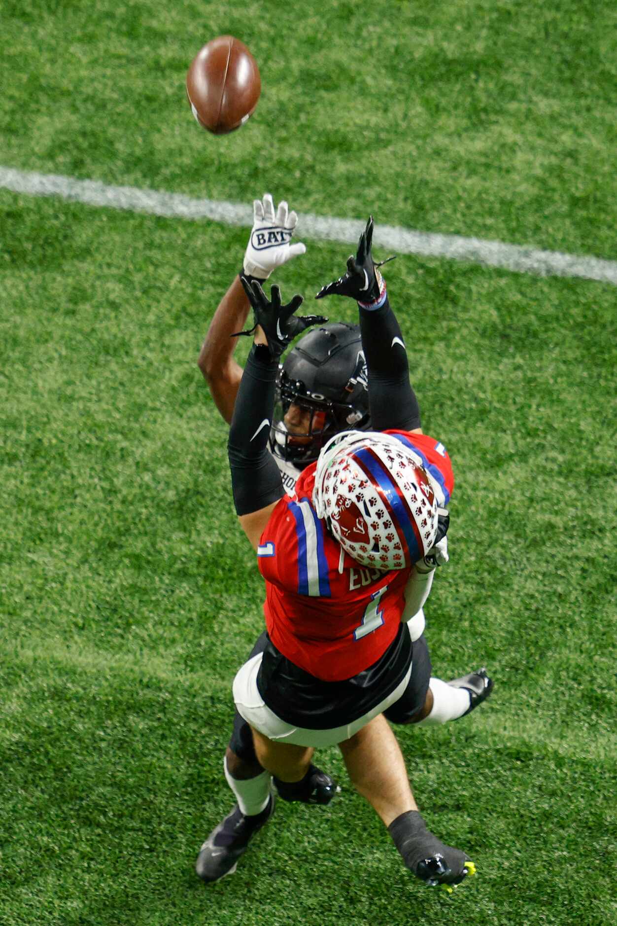 Parish Episcopal wide receiver Derek Eusebio (1) makes a leaping catch over Bishop Lynch's...