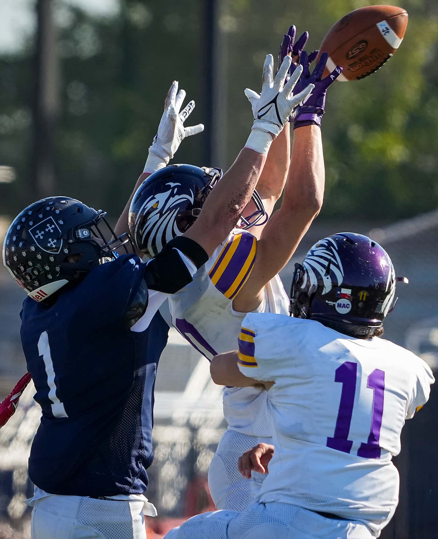 Houston Kinkaid defensive back Miles Roeder (20) intercepts a pass intended for Episcopal...