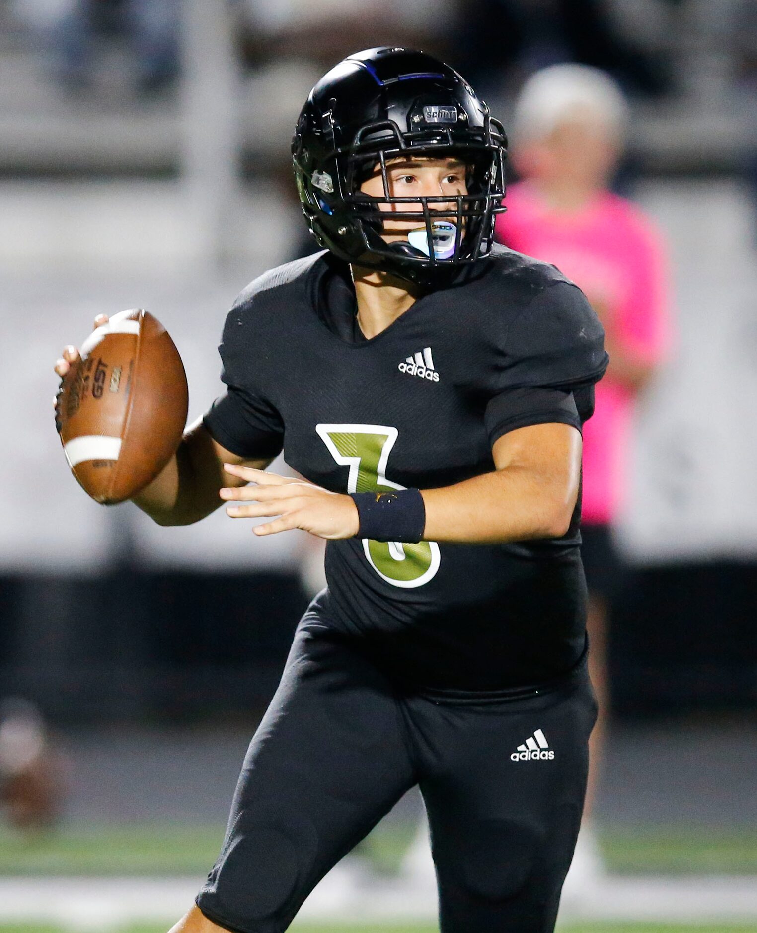 Kaufman senior quarterback Derek Clamon (3) throws during the first half of a high school...