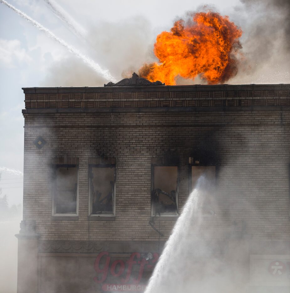 Firefighters battle flames at Golf's Hamburgers on Friday, August 12, 2016 on Hillcrest...