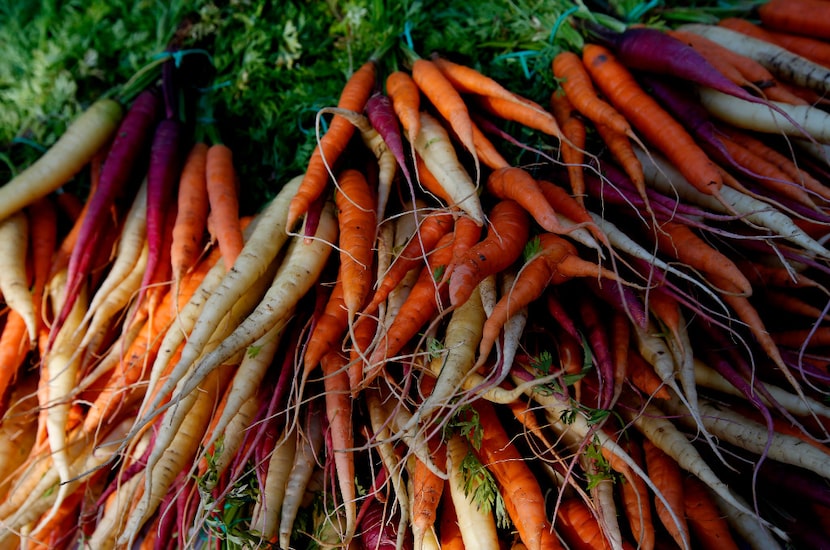 Carrots for sale at the stand of Megan Neubauer of Pure Land Organic at the Historic...